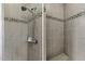 Tiled shower with a rainfall shower head and built-in bench at 105 Della St, Chapel Hill, NC 27516