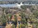 An aerial view of waterfront homes nestled among the trees, with a lake view at 109 Mohawk Dr, Louisburg, NC 27549
