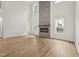 Bright living room with fireplace and hardwood floors at 109 Mohawk Dr, Louisburg, NC 27549