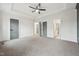 Large main bedroom with multiple doors and a view of the bathroom at 109 Mohawk Dr, Louisburg, NC 27549