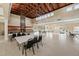A spacious meeting room with a stone fireplace offers a welcoming atmosphere at 109 Mohawk Dr, Louisburg, NC 27549