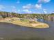 Recreational area with picnic tables, lake, playground, and green space at 109 Mohawk Dr, Louisburg, NC 27549