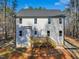 Two-story home features a backyard deck with a private entrance and neatly landscaped border at 109 Mohawk Dr, Louisburg, NC 27549