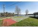 Shuffleboard court near the lake with waterfront views at 109 Mohawk Dr, Louisburg, NC 27549