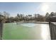A vibrant tennis court provides recreational activity and community engagement at 109 Mohawk Dr, Louisburg, NC 27549