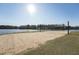 Enjoy beach volleyball on the sandy lakeside court, perfect for sunny recreation at 109 Mohawk Dr, Louisburg, NC 27549