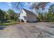 Spacious two car garage with ample parking space and charming architectural details; rear view at 1106 Aycock Ave, Burlington, NC 27215
