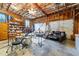 A multi-purpose garage, transformed into a music studio with rustic wood walls and comfortable seating at 1106 Aycock Ave, Burlington, NC 27215