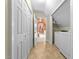 Hallway with multiple closets leading to the bathroom and laundry area at 1106 Aycock Ave, Burlington, NC 27215