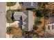 Aerial view showcasing the roof of a house with a spacious backyard and a cozy deck at 1217 Wedgeland Dr, Raleigh, NC 27615