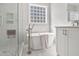Elegant bathroom featuring a luxurious soaking tub and glass shower at 1217 Wedgeland Dr, Raleigh, NC 27615