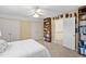 Bright bedroom featuring a ceiling fan and spacious closet space at 1217 Wedgeland Dr, Raleigh, NC 27615