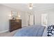 Cozy bedroom with a comfortable bed and neutral decor at 1217 Wedgeland Dr, Raleigh, NC 27615