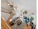Inviting living area with fireplace, comfortable seating, and staircase access at 1217 Wedgeland Dr, Raleigh, NC 27615