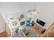 Bright living room showcasing fireplace and stylish decor, seen from an elevated angle at 1217 Wedgeland Dr, Raleigh, NC 27615