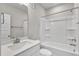 Clean bathroom featuring a shower-tub combination and a sleek single-sink vanity with neutral walls at 1226 Coach Station Alley # 101, Raleigh, NC 27601
