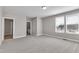 Another view of the bedroom, showing the door and window layout at 1226 Coach Station Alley # 101, Raleigh, NC 27601
