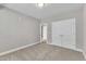 Inviting bedroom with carpet flooring, complemented by neutral walls, a closet, and recessed lighting at 1226 Coach Station Alley # 101, Raleigh, NC 27601