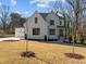 Charming two-story home with a well-manicured lawn and a welcoming front entrance at 1318 Ivy Ln, Raleigh, NC 27609