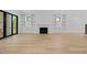 Spacious living room featuring a fireplace and built-in shelving at 1318 Ivy Ln, Raleigh, NC 27609