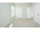 Bright bedroom with neutral carpet, natural light, and closet space at 133 Ambergate Ct, Rocky Mount, NC 27804