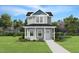 Charming two-story home with a welcoming front porch and beautiful landscaping at 133 Ambergate Ct, Rocky Mount, NC 27804