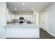 Stylish kitchen featuring white cabinets, granite countertops and stainless steel appliances at 133 Ambergate Ct, Rocky Mount, NC 27804