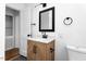 Chic bathroom with modern vanity, stylish mirror, and contemporary finishes at 1409 Ida St, Durham, NC 27705