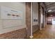 Exposed brick hallway showing the Caraleigh Mills timeline at 1535 Caraleigh Mills Ct # 105, Raleigh, NC 27603