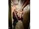 Interior of a 12x5 storage unit with shelves and various stored items at 1535 Caraleigh Mills Ct # 105, Raleigh, NC 27603