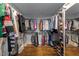 Spacious walk-in closet with custom shelving and shoe storage at 1535 Caraleigh Mills Ct # 105, Raleigh, NC 27603
