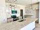 New kitchen featuring stainless appliances, granite countertop island, and modern light fixtures at 158 Nimble Way # 226, Clayton, NC 27520