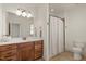 Charming bathroom with a vanity, shower, and toilet offering a blend of style and functionality at 162 Arabella Ct, Cary, NC 27518