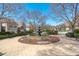 Charming community area featuring a water fountain, benches, and manicured landscaping at 162 Arabella Ct, Cary, NC 27518
