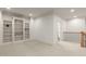 Upstairs bonus room with built in bookshelves, carpet, crown moulding, and neutral paint at 162 Arabella Ct, Cary, NC 27518