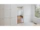 Dining area showcasing hardwood floors, white trim, and adjacent pantry at 1628 Park Dr, Raleigh, NC 27605