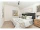 Comfortable bedroom featuring a plush bed, soft carpet, and large picture window at 168 Daphine Dr, Hillsborough, NC 27278