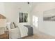 Cozy bedroom with a large window overlooking the trees and plush carpeting at 168 Daphine Dr, Hillsborough, NC 27278