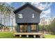 Modern two-story home with dark siding, offering curb appeal and contemporary design at 168 Daphine Dr, Hillsborough, NC 27278