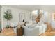 Bright and airy living room with modern decor, hardwood floors, and natural light at 168 Daphine Dr, Hillsborough, NC 27278