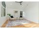 Bright living room features hardwood floors, modern decor, and plenty of natural light at 168 Daphine Dr, Hillsborough, NC 27278
