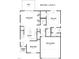 First floor plan featuring a living room, kitchen, dining room, main suite, and garage at 169 Tigris Ct, Zebulon, NC 27597