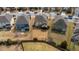 Aerial view of property with a large, fenced backyard and neighborhood surroundings at 1715 Capstone Dr, Durham, NC 27713