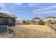 Spacious backyard featuring a well-maintained lawn and a screened-in porch at 1715 Capstone Dr, Durham, NC 27713