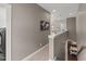 Well-lit hallway with neutral paint color connects multiple rooms in the home at 1715 Capstone Dr, Durham, NC 27713