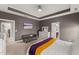Relaxing bedroom featuring a cozy seating area and easy access to the ensuite bathroom and closet at 1715 Capstone Dr, Durham, NC 27713