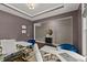 Spacious home office features dark accent wall, modern lighting, and two desks at 1715 Capstone Dr, Durham, NC 27713