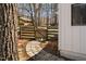 A peaceful backyard entrance with a stone path and wooden gate at 202 High St, Carrboro, NC 27510