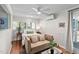 Cozy bedroom with hardwood floors, large window and mini split for efficient heating and cooling at 202 High St, Carrboro, NC 27510