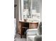 Living room detail highlighting a stylish side table, lamp, and view through a sunlit window at 202 High St, Carrboro, NC 27510